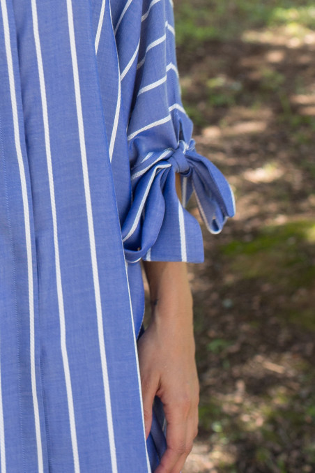 Blusón unitalla corto con cuello camisero y manga francesa con lazos Blusón unitalla corto con cuello camisero y manga francesa con lazos